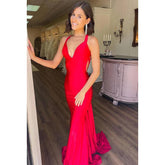 Robe de soirée sirène sexy et tendance avec col en V et bretelles croisées dans le dos