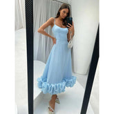 Robe de soirée longue à bretelles spaghetti et volants