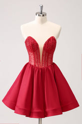 Lindo vestido rojo de fiesta de bienvenida, corte en A, sin tirantes, con corsé, volantes y pedrería.