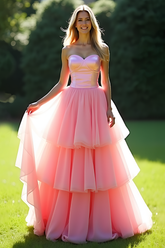 Robe de bal longue rose trapèze à décolleté cœur et volants