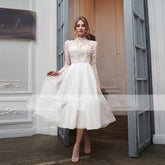 Robe de mariée courte en tulle élégante, col montant, manches longues et application luxueuse, sur mesure, longueur thé, boutonnée, Vestidos