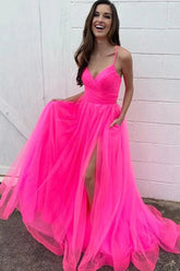 Robe de bal longue en tulle rose fuchsia, coupe trapèze, avec poches