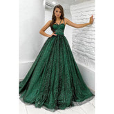 Robe de bal trapèze scintillante à bretelles spaghetti et poches