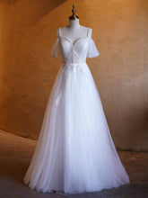 Vestidos de fiesta largos hasta el suelo con escote en V y adornos de perlas