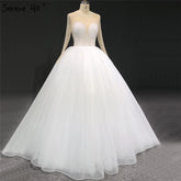 Robe de mariée sexy ivoire à manches longues et paillettes, col rond, sur mesure, HA2332