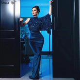En oferta, sin devoluciones ni reembolsos. Vestidos de noche sexys de sirena en satén azul marino, colección 2025, con lentejuelas, un solo hombro y mangas murciélago. Vestido formal LA70347