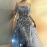 Robe de soirée sirène bleue 2025, luxueuse robe de soirée saoudienne ornée de plumes et de perles, avec jupe superposée, pour une occasion formelle, LA72727