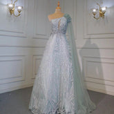 Robe de soirée sexy style arabe turquoise, coupe trapèze, asymétrique, manches cape, perles, luxueuse, 2025, LA71741