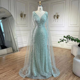 Robe de soirée sirène turquoise arabe Dubaï avec manches cape perlées élégantes et luxueuses pour soirée femme 2025 LA72574