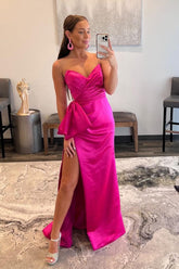 Robe de bal longue rose fuchsia à décolleté cœur et fente sur le devant