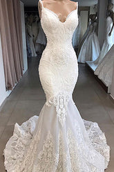 Magnifique robe de mariée sirène longue en tulle dos nu ornée d'appliqués et d'appliques