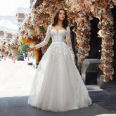 Vestido de novia corte A, manga larga desmontable, elegante, espalda descubierta, encaje, apliques de tul.