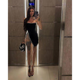 Robe de soirée noire bustier chic et moderne ornée de perles