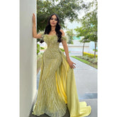 Robe de soirée longue fourreau à épaules dénudées et paillettes avec traîne