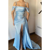 Robe de soirée sirène longue à bretelles spaghetti et perles avec fente