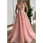 Robe de bal trapèze en tulle rose avec poches