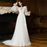 Elegant Glitter Tulle Deep V-Neck Wedding Dresses Princess Shiny Lantern Sleeves Backless A-Line Pleated Bridal Gowns