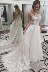 Vestidos de novia de encaje marfil con apliques transparentes y cola de corte WD296