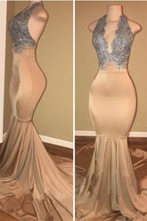 Vestidos de sirena de lujo sin mangas con apliques de encaje y cuello halter para baile de graduación.