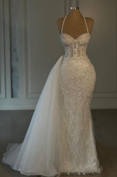 Robe de mariée sirène longue ivoire sans manches, dos nu, dentelle et perles, absolument sublime