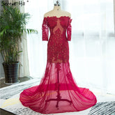 Vestido de noche sirena sexy con hombros descubiertos y encaje, mangas cortas. Fotografía HA2139