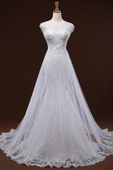 Vestidos de novia elegantes de sirena con apliques de lentejuelas y tul.