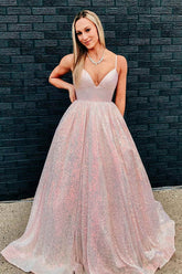 Impresionante vestido largo de fiesta rosa con lentejuelas y corte en A