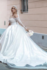 Vestido de novia vintage blanco de manga larga estilo princesa, de satén con encaje.