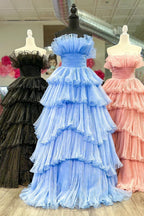 Charmante robe de bal longue bleue bustier trapèze à volants