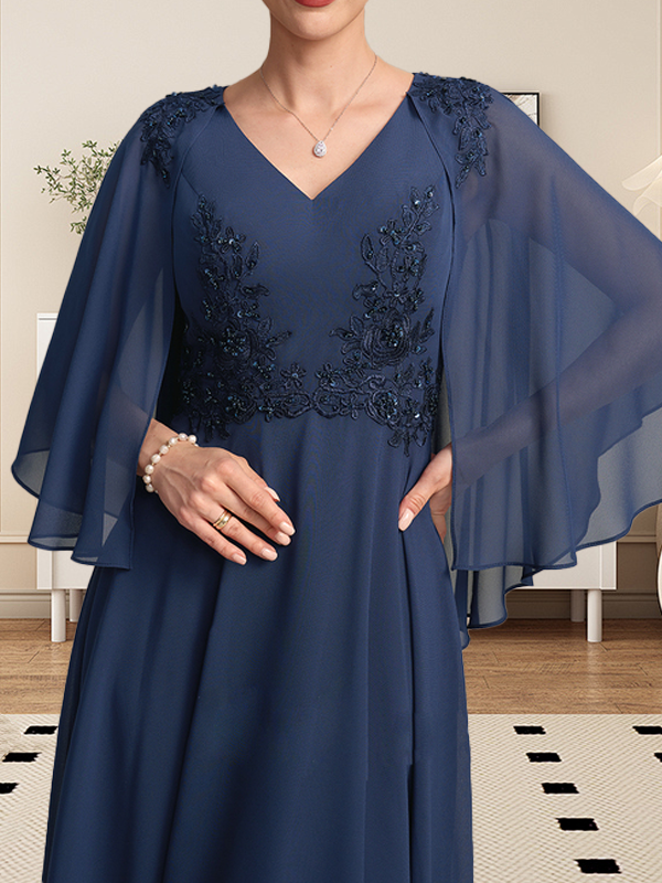 Vestido de corte A, escote en V, largo hasta la rodilla, de gasa, encaje, con lentejuelas y pedrería para la madre de la novia.