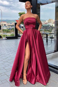 Vestido largo de fiesta sin tirantes con abertura y bolsillos