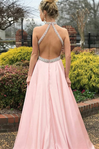Robe de bal longue rose sans manches à col halter ornée de cristaux