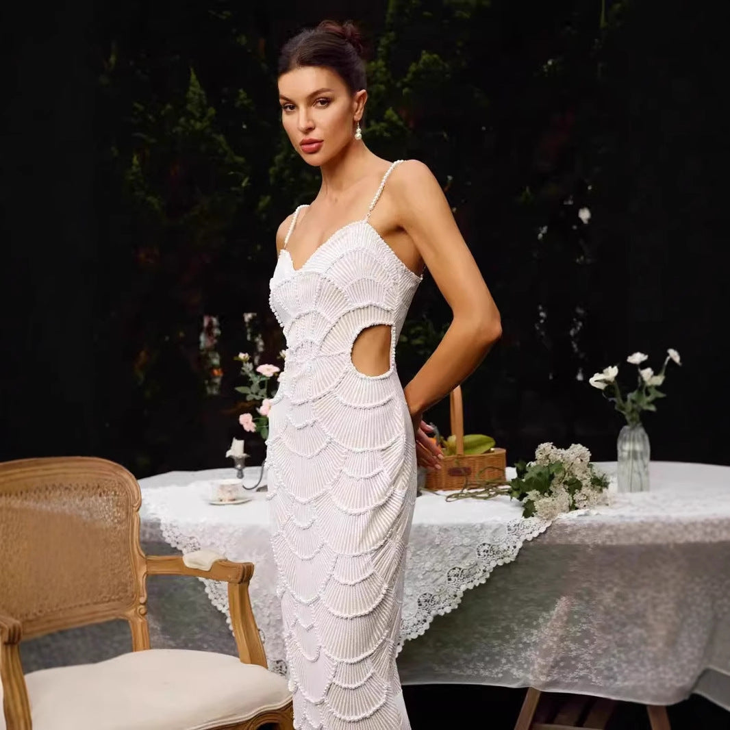 Vestido de graduación sin tirantes con vendaje y adornado con perlas 
