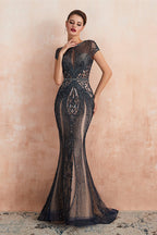 Vestido largo de fiesta de sirena con cuentas y mangas cortas