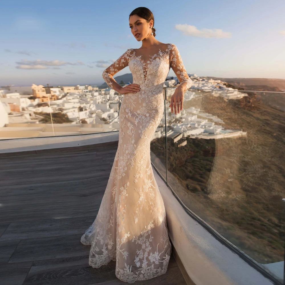 Preciosos vestidos de novia de sirena de encaje de manga larga con apliques de lujo, botones, cola desmontable y cuerno.