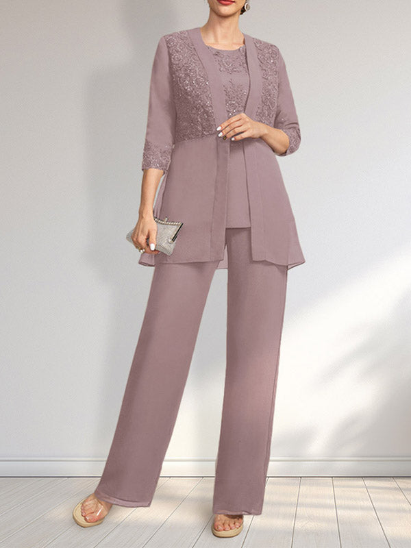 Vestido de novia de gasa con encaje y lentejuelas, estilo mono/traje pantalón, largo hasta el suelo, con escote redondo.