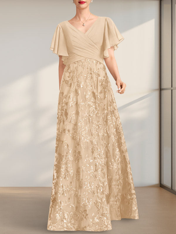 Vestido de novia de corte A, escote en V, largo hasta el suelo, de encaje, lentejuelas y gasa, con pliegues.
