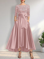 Vestido de madrina de la novia, corte asimétrico, escote ilusión, satén y encaje, con lazo.