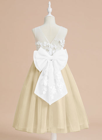 Vestido midi de encaje floral y lazo grande 