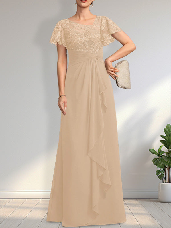 Vestido de novia de corte asimétrico, ilusión, largo hasta el suelo, de encaje y gasa, con cascada de volantes y lentejuelas. 