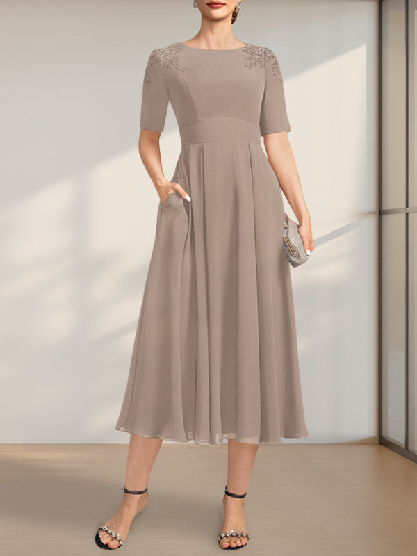 Vestido de corte A, escote redondo, largo té, de gasa, para la madre de la novia, con apliques de encaje y lentejuelas.