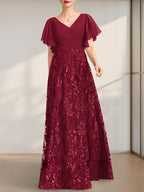 Vestido de novia de corte A, escote en V, largo hasta el suelo, de encaje, lentejuelas y gasa, con pliegues.
