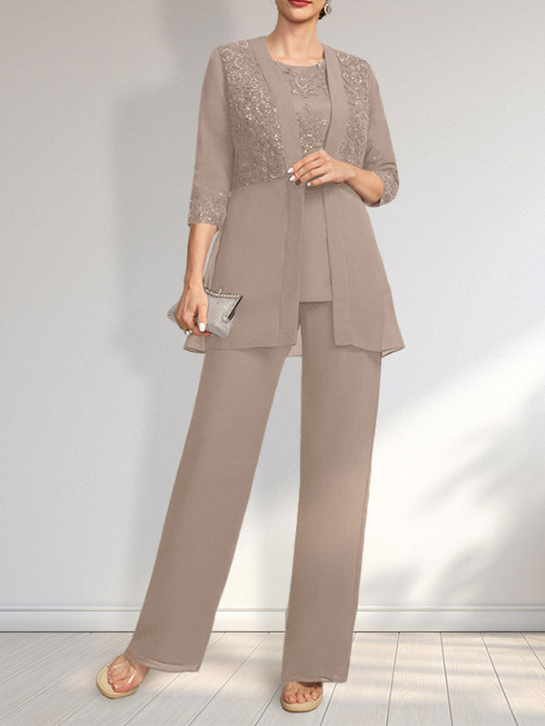 Vestido de novia de gasa con encaje y lentejuelas, estilo mono/traje pantalón, largo hasta el suelo, con escote redondo.