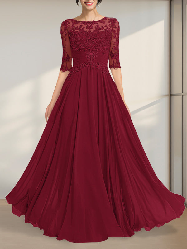 Vestido de novia de corte A, escote ilusión, largo hasta el suelo, de gasa y encaje, con lentejuelas plisadas.
