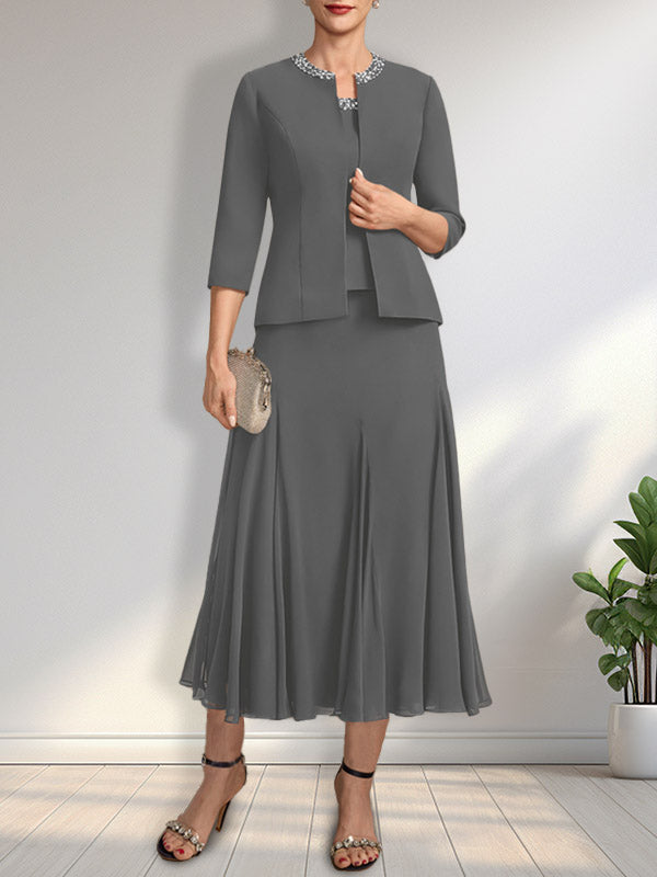 Vestido de novia de gasa, corte línea A, escote redondo, largo té, con lentejuelas y pedrería. 