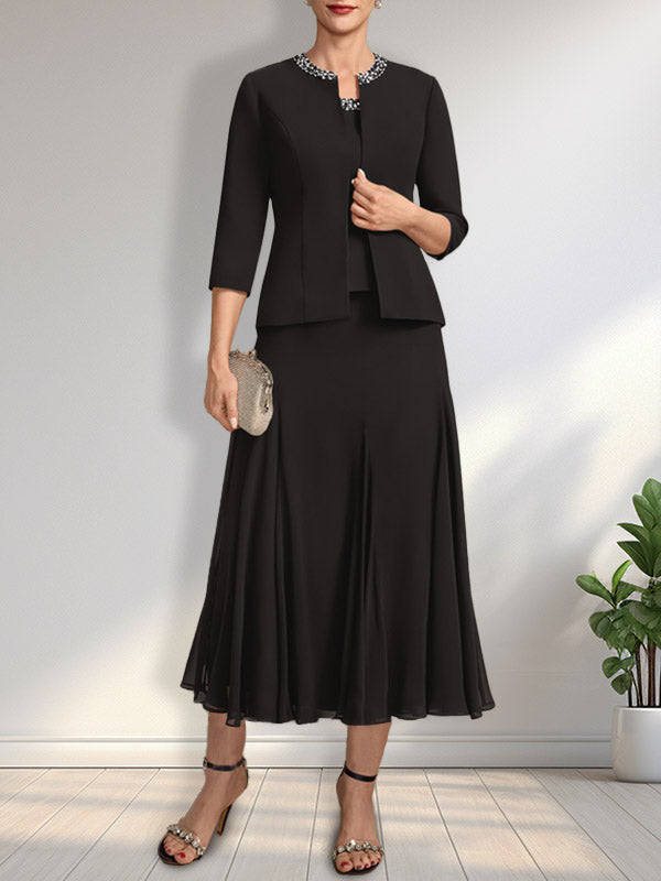 Vestido de novia de gasa, corte línea A, escote redondo, largo té, con lentejuelas y pedrería. 