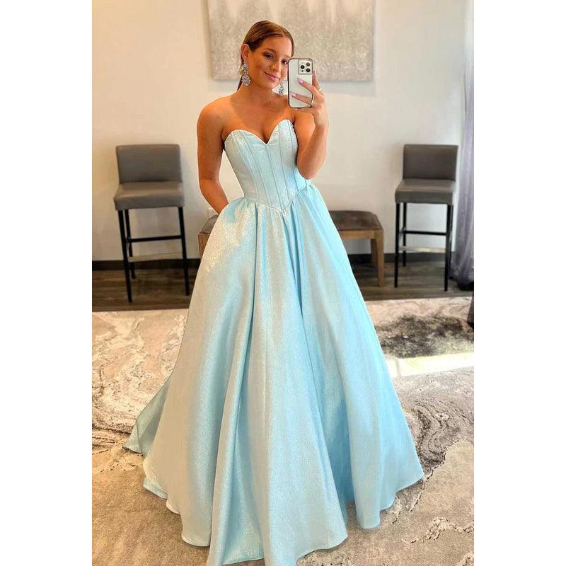 Vestido de fiesta largo de corte A con escote en forma de corazón, sin tirantes y brillante, con bolsillos