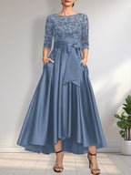 Vestido de madrina de la novia, corte asimétrico, escote ilusión, satén y encaje, con lazo.