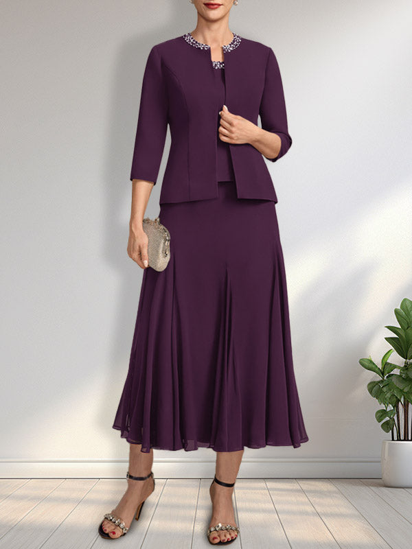 Vestido de novia de gasa, corte línea A, escote redondo, largo té, con lentejuelas y pedrería. 