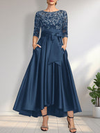 Vestido de madrina de la novia, corte asimétrico, escote ilusión, satén y encaje, con lazo.